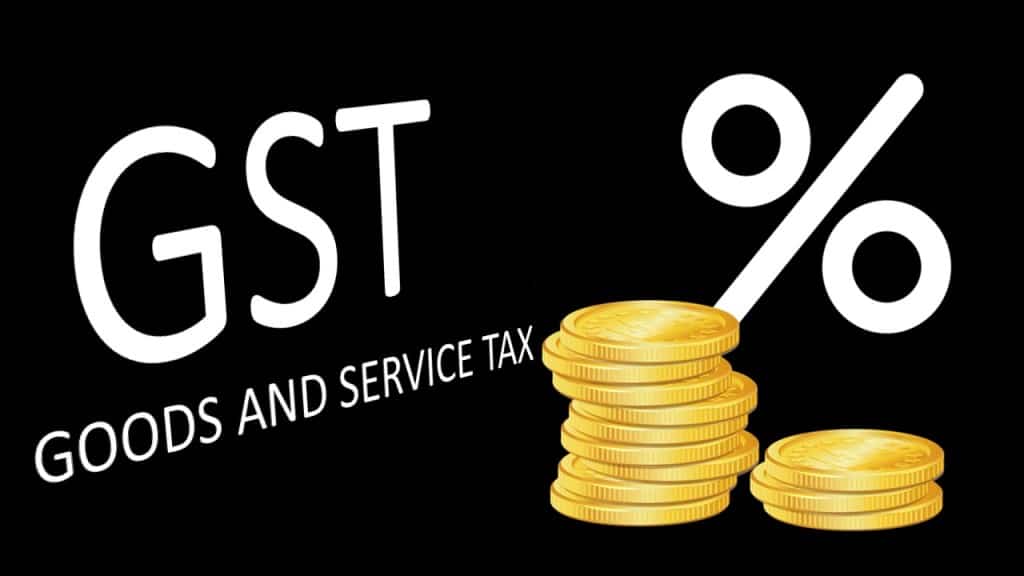 GST GOODS AND SERVICE TAX MENTIONED,  PERCENTAGE AND COIN IMAGE
