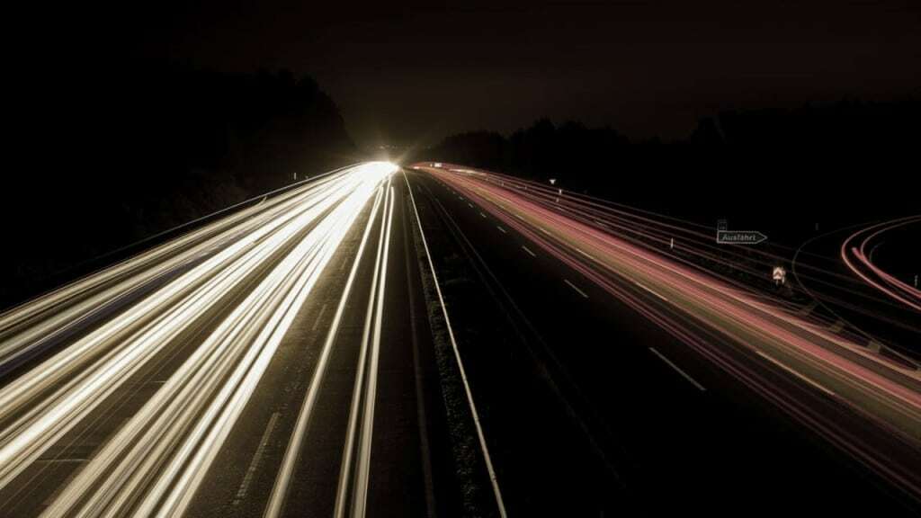 over speeding of cars flashing lights on road